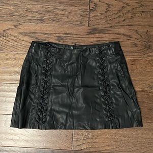 Black leather mini skirt